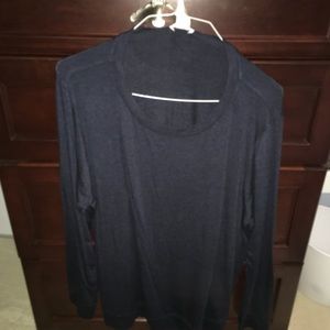 Tunic with zippers at waist and 1/2 way up on side